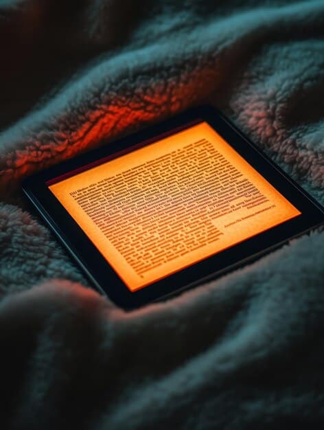 A close-up of an e-reader screen displaying text, showcasing the e-ink technology. The screen is contrasted against a printed book to highlight the similarity in appearance.