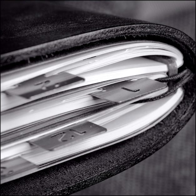 An extreme close-up of a foldable phone's hinge mechanism, showcasing the intricate engineering and robust construction. Lighting emphasizes the metallic components and smooth movement of the hinge.